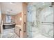 Modern bathroom with a glass-enclosed shower, a freestanding tub, and marble tile flooring for a luxurious experience at 75 14Th St # 3640, Atlanta, GA 30309