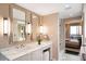 Modern bathroom with double vanity and marble countertops at 75 14Th St # 3640, Atlanta, GA 30309