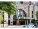 Four Seasons Hotel entrance with valet and guests at 75 14Th St # 3640, Atlanta, GA 30309