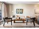 Inviting living room showcasing comfortable seating arrangements, stylish décor, and access to a scenic balcony at 75 14Th St # 3640, Atlanta, GA 30309