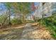 Exterior walking path surrounded by lush greenery at 1115 Cannongate Sw Xing, Marietta, GA 30064