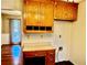 Laundry nook with desk, cabinets, and washer/dryer hookups at 321 Bouldercrest Way, Woodstock, GA 30188