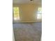 Spacious bedroom with neutral walls and carpet and view from two sunny windows at 1255 Silverstone Trl, Jonesboro, GA 30238