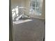 Bedroom featuring a window with lots of natural light and carpet flooring at 1255 Silverstone Trl, Jonesboro, GA 30238