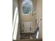 Bright foyer features a chandelier and large window over the front door at 1255 Silverstone Trl, Jonesboro, GA 30238