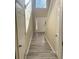 Welcoming foyer with new flooring, staircase, and a decorative front door at 1255 Silverstone Trl, Jonesboro, GA 30238