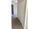 Hallway featuring double door closet for extra storage at 1255 Silverstone Trl, Jonesboro, GA 30238