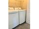 Laundry room featuring newer white washer and dryer units at 1255 Silverstone Trl, Jonesboro, GA 30238