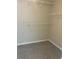 Walk-in closet provides shelving for clothing and storage at 1255 Silverstone Trl, Jonesboro, GA 30238