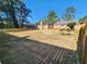 Large backyard with a wooden deck and a privacy fence at 4129 Pepperdine Dr, Decatur, GA 30034