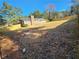 Large backyard with a wooden fence and mature trees at 4129 Pepperdine Dr, Decatur, GA 30034