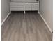 Clean and spacious basement with gray vinyl plank flooring at 4129 Pepperdine Dr, Decatur, GA 30034