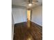Bedroom with hardwood floors, ceiling fan, and spacious closet at 4129 Pepperdine Dr, Decatur, GA 30034