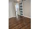 Hardwood floors and closet with bi-fold doors at 4129 Pepperdine Dr, Decatur, GA 30034