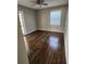 Bedroom with hardwood floors, french doors and ceiling fan at 4129 Pepperdine Dr, Decatur, GA 30034
