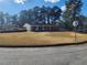 Ranch style home with carport and well-manicured lawn at 4129 Pepperdine Dr, Decatur, GA 30034