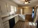 Bright kitchen boasts granite countertops, updated cabinetry, and a breakfast bar at 4129 Pepperdine Dr, Decatur, GA 30034