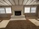 Living room with a brick fireplace and wood flooring at 4129 Pepperdine Dr, Decatur, GA 30034