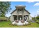 Beautiful backyard with patio, outdoor seating area and lush landscaping, ideal for relaxation at 40 Spirea Way, Auburn, GA 30011