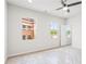 Bright bedroom featuring two windows and a ceiling fan for optimal comfort at 40 Spirea Way, Auburn, GA 30011