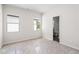 Bright bedroom featuring two windows, a closet, neutral walls, and new carpet at 40 Spirea Way, Auburn, GA 30011