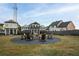 Outdoor fire pit featuring Adirondack chairs, perfect for community gathering at 40 Spirea Way, Auburn, GA 30011
