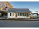 Charming building exterior with a peach-colored door and a modern farmhouse design, street view at 40 Spirea Way, Auburn, GA 30011