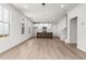 Inviting open-concept living space featuring hardwood floors and an island kitchen at 40 Spirea Way, Auburn, GA 30011