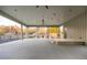 Spacious covered patio with a ceiling fan, perfect for outdoor entertainment and relaxation at 40 Spirea Way, Auburn, GA 30011