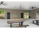 Large pavilion featuring picnic tables, fans, and a raised platform for activities and entertainment at 40 Spirea Way, Auburn, GA 30011