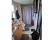 Bathroom with vanity, toilet, and shower featuring decorative gray shower curtains at 230 Highland Blvd, Stockbridge, GA 30281
