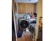 Modern laundry room with front-load washer and dryer provides convenience at 230 Highland Blvd, Stockbridge, GA 30281
