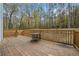 Spacious wooden deck overlooking the backyard at 1238 Sandy Creek Rd, Fayetteville, GA 30214