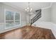 Bright dining room with hardwood floors and chair railing at 1238 Sandy Creek Rd, Fayetteville, GA 30214