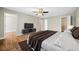 Main bedroom with ceiling fan and large walk-in closet at 1238 Sandy Creek Rd, Fayetteville, GA 30214