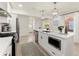 Modern kitchen with island, white cabinets and stainless steel appliances at 2458 Lynn Iris Dr, Decatur, GA 30032