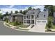 Aerial view of a charming house with a three-car garage at 1005 Coleman Place Dr, Roswell, GA 30075