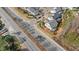 Aerial view of house and surrounding neighborhood, showcasing curb appeal and community at 1005 Coleman Place Dr, Roswell, GA 30075