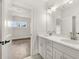 Double vanity bathroom with quartz countertops and a view at 1005 Coleman Place Dr, Roswell, GA 30075