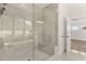 Spacious walk-in shower with built-in bench and glass enclosure at 1005 Coleman Place Dr, Roswell, GA 30075