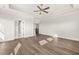 Main bedroom with hardwood floors and access to the bathroom and upper hallway at 1005 Coleman Place Dr, Roswell, GA 30075