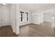 Spacious dining room featuring hardwood floors and a stylish chandelier at 1005 Coleman Place Dr, Roswell, GA 30075