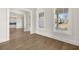 Bright dining room with hardwood floors and view of kitchen at 1005 Coleman Place Dr, Roswell, GA 30075