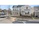 House exterior view, showcasing a two-story home with gray siding and a landscaped yard at 1005 Coleman Place Dr, Roswell, GA 30075