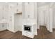 Built-in microwave and additional white cabinets in kitchen area at 1005 Coleman Place Dr, Roswell, GA 30075