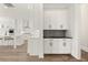 Modern kitchen with white cabinets and dark countertops at 1005 Coleman Place Dr, Roswell, GA 30075