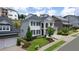 Aerial view of a two-story house with black shutters and a metal roof at 1010 Coleman Place Dr, Roswell, GA 30075