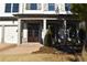 Elegant front entrance with double doors and a brick walkway at 1010 Coleman Place Dr, Roswell, GA 30075