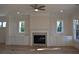 Fireplace with built-in shelving and hardwood floors at 1010 Coleman Place Dr, Roswell, GA 30075