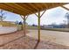 Partially covered backyard patio, overlooking a large grassy area at 2870 S Waterworks Rd, Buford, GA 30518